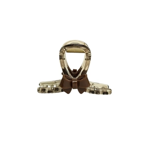 Elegant smokey grey acrylic bow hair claw clip with golden metal spring for women