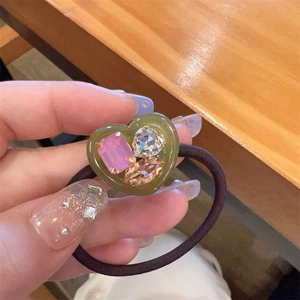 Army green jelly heart hair tie with colorful crystals and dark brown elastic band