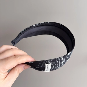 Handmade black paisley printed wide fabric headband with vintage floral knot pattern