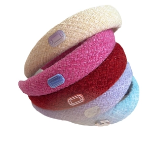 Padded tweed headbands with rectangle gemstone detail in five elegant assorted colors