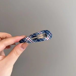 Handheld blue plaid fabric geometric BB hair clip with blue white red checkered pattern