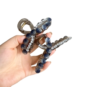 Sparkling crystal shark hair claw clip set with resin finish and blue diamond accents