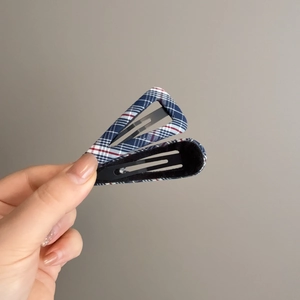 Set of two blue plaid fabric hair clips in classic teardrop shape with metal grip