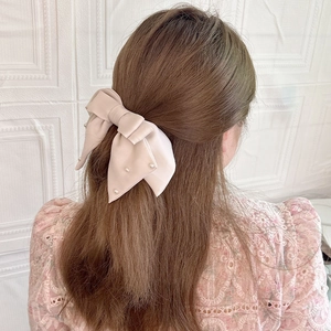 Elegant beige satin bow hair clip with white pearls for women's graceful hairstyle