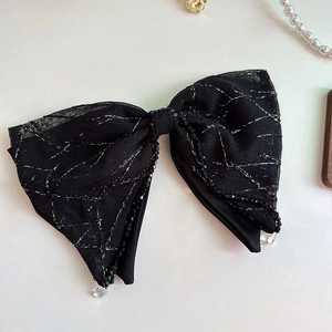 Elegant black mesh bow hair scrunchie with silver texture and hanging teardrop beads
