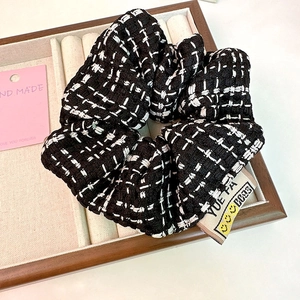 Elegant black and white tweed scrunchie hair tie with check pattern for women