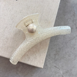 Elegant vintage cream marble acetate hair claw clip with pearl accents for women