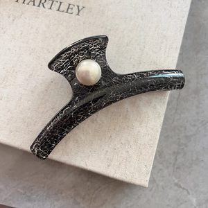 Vintage black marble pattern hair claw clip with a large pearl inlay for women