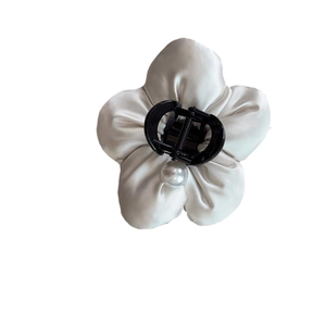 Elegant satin flower hair claw with a central pearl decoration for women's hair styling