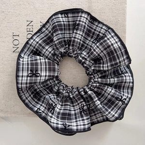 Classic black and white checkered oversized scrunchie with delicate butterfly embroidery