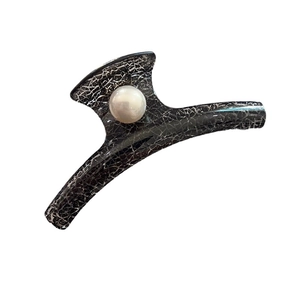 Vintage large hair claw with black silver pattern and pearl accent on white background