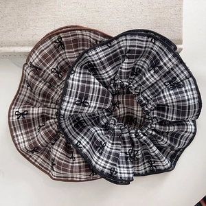 Preppy style plaid scrunchies with black bow embroidery details in two-piece set