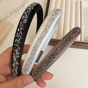 French style padded rhinestone headband set in black, white, and brown satin