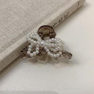 Elegant smoked resin hair claw clip with exquisite double layered pearl bow design