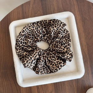 Brown leopard print oversized scrunchie hair tie for women with a vintage retro aesthetic