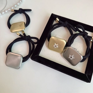 Set of 4 brushed metal square hair ties in gold and silver finish with star zircon accents