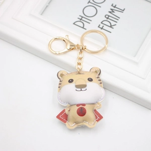 Porte-clés mignon tigre en cuir avec cape rouge et fermoir mousqueton doré chic
