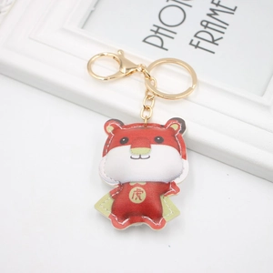 Mignon porte-clés tigre en cuir rouge et blanc avec clip en métal doré brillant