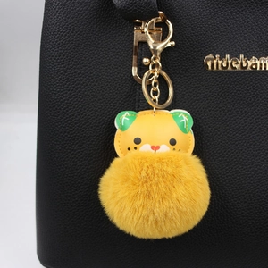 Cute yellow cartoon tiger plush pom pom keychain accessory for women's handbags