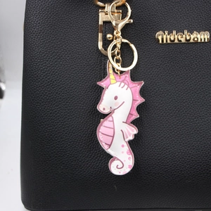 Portachiavi creativo a forma di ippocampo unicorno in ecopelle rosa e bianca per borse