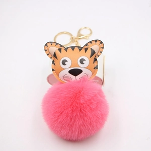 Pendentif tigre en cuir mignon avec pompon en fausse fourrure rose et porte-clés doré