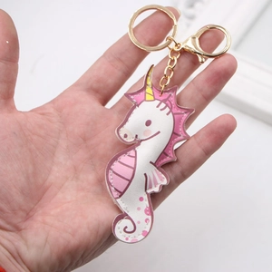 Portachiavi a forma di cavalluccio marino in pelle PU rosa e bianca con moschettone