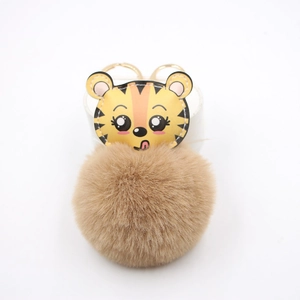 Pendentif tigre en cuir avec pompon marron et anneau doré pour sac à main