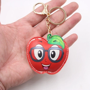 Cartoon red leather apple keychain with smiling face and gold metal lobster clasp