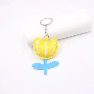 Charming tulip flower leather keychain with yellow petals and blue stem detailing