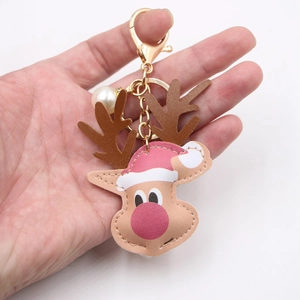 Christmas reindeer leather keychain with gold lobster clasp and pearl charm for bag decor