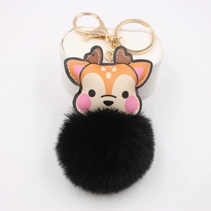 Cute faux leather reindeer keychain with soft black plush pompom and golden clip