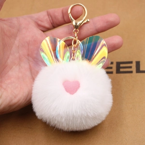 Portachiavi a forma di coniglio di peluche bianco con orecchie olografiche e cuore rosa