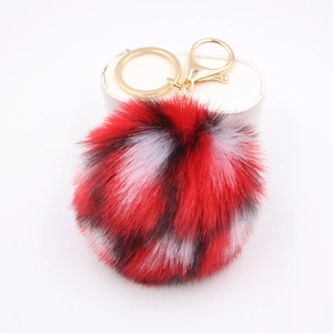Portachiavi a pompon in peluche con anello dorato e clip per borse e borsette