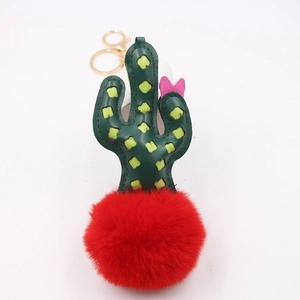 Dark green leather cactus keychain with red pompom and golden lobster clasp