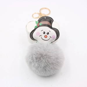 Christmas snowman plush keychain featuring a grey faux fur pompom and golden lobster clasp