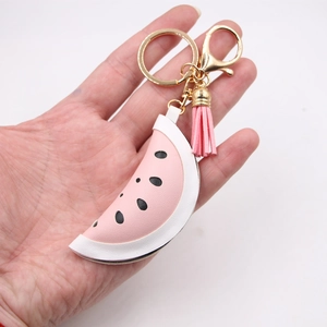 Creative watermelon leather keychain with pink tassel and gold metal hardware