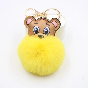 Porte-clés ours à pompon peluche jaune vif avec anneau doré et fermoir mousqueton