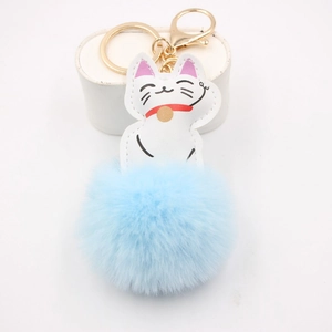 Lucky Maneki Neko cat keychain with light blue faux fur pom pom and gold lobster clasp