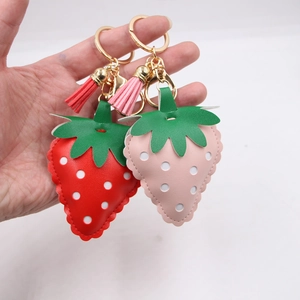 Cute strawberry leather keychain with tassels and golden clip charms for bags