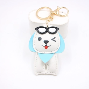 Porte-clés chien en cuir avec lunettes de soleil et fermoir doré pour sacs à main