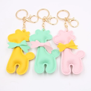 Süßer Giraffe Cartoon PU Leder Schlüsselanhänger Für Damen Taschenanhänger Mit Schleife Gold Metall Schlüsselring Schmuck