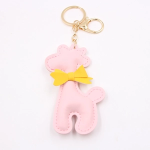 Rosa Giraffe Leder Schlüsselanhänger mit gelber Schleife und Goldring für Taschen und Autos