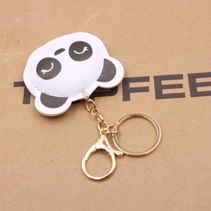 Cute leather panda keychain with gold-tone metal hardware for bags and car key accessories