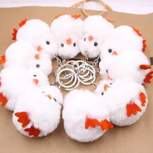 Lot de dix mignons porte-clés caneton en peluche blanche avec des pieds orange vifs