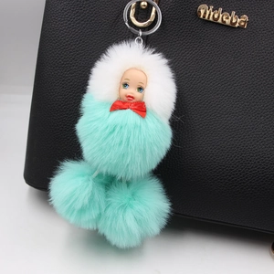 Beautiful sleeping doll pom-pom keychain pendant for bags in mint green and white