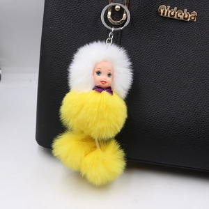 Cute sleeping doll plush pompom keychain with white fur ball charm for bags and purses