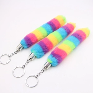 Rainbow faux fur tail keychain set with colorful gradient plush for bags and wallets