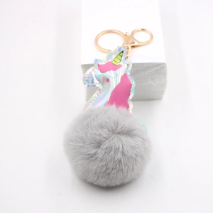 Plush grey unicorn keychain with laser holographic leather finish and gold ring