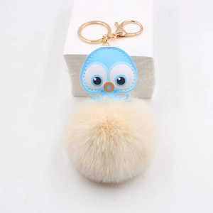 Cute leather octopus pom pom keychain with light blue PU head and cream plush ball