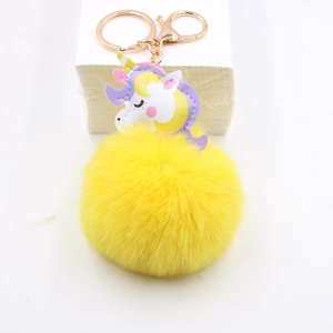 Süßer gelber Kunstfell Einhorn Schlüsselanhänger mit rotgoldenem Ring für Taschen Zubehör
